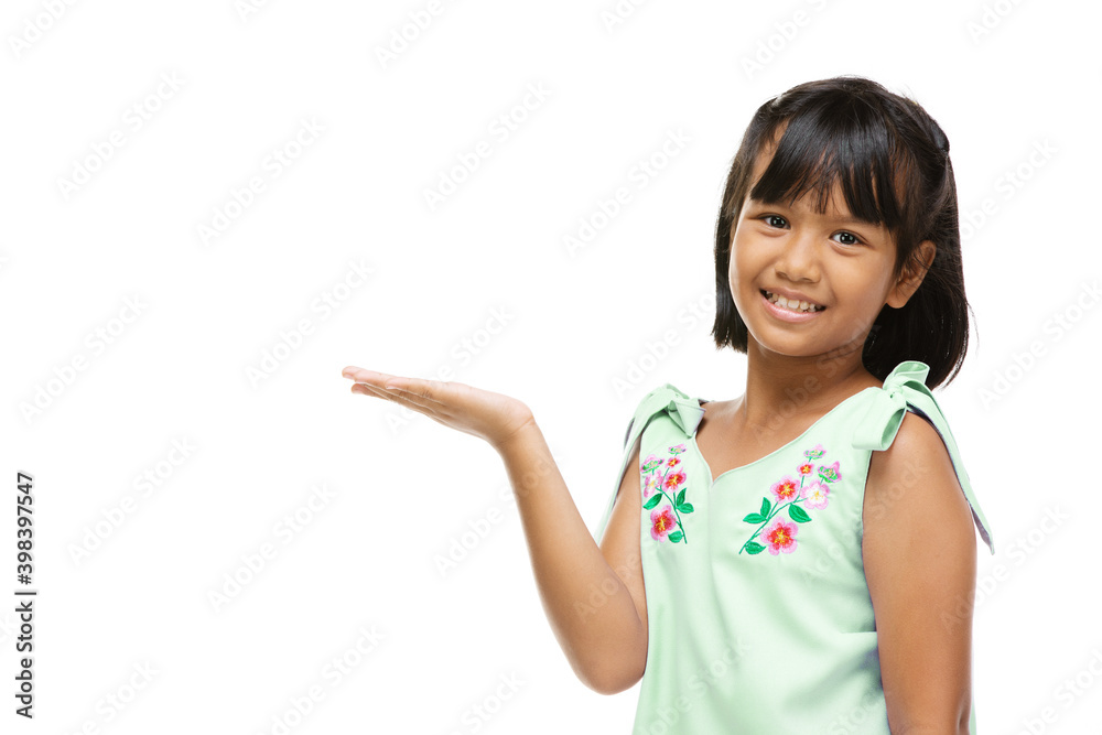 Asian cute girl presenting something on hand over white background Asian cute girl presenting something on hand over white background