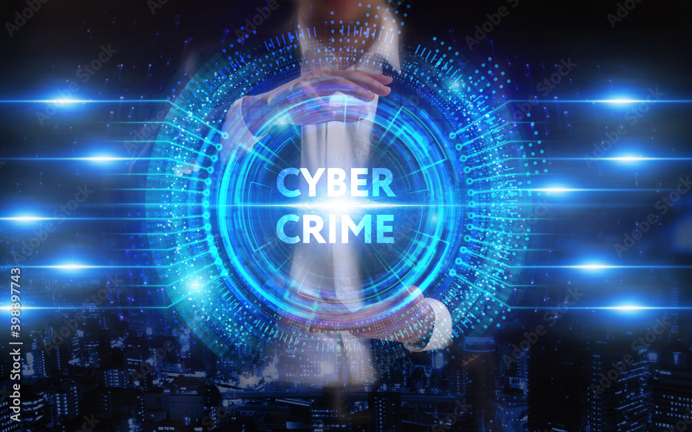 Fototapeta premium Business, Technology, Internet and network concept. Young businessman working on a virtual screen of the future and sees the inscription: Cyber crime