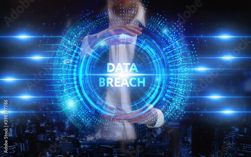 Business, Technology, Internet and network concept. Young businessman working on a virtual screen of the future and sees the inscription: Data breach