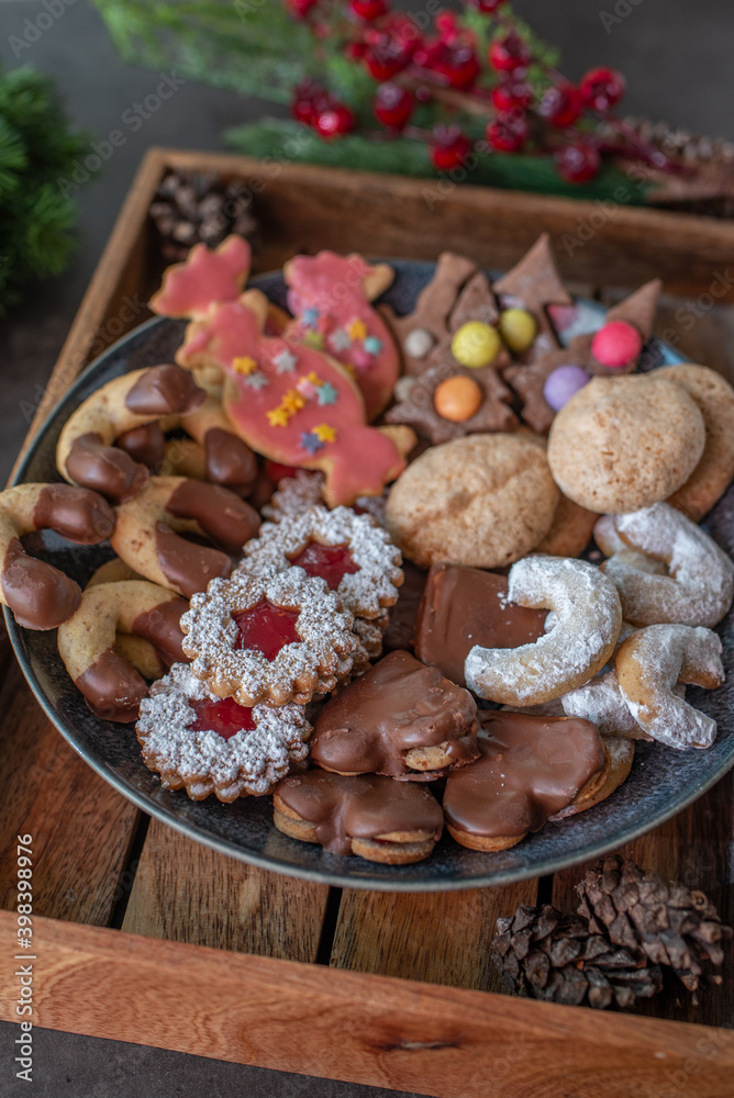 Traditional home made German Christmas Cookies on a festive table Traditional home made German Christmas Cookies on a festive table