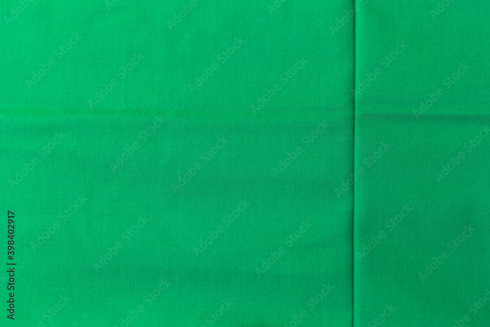 Fototapeta premium Abstract green fabric texture background, blank green fabric pattern background