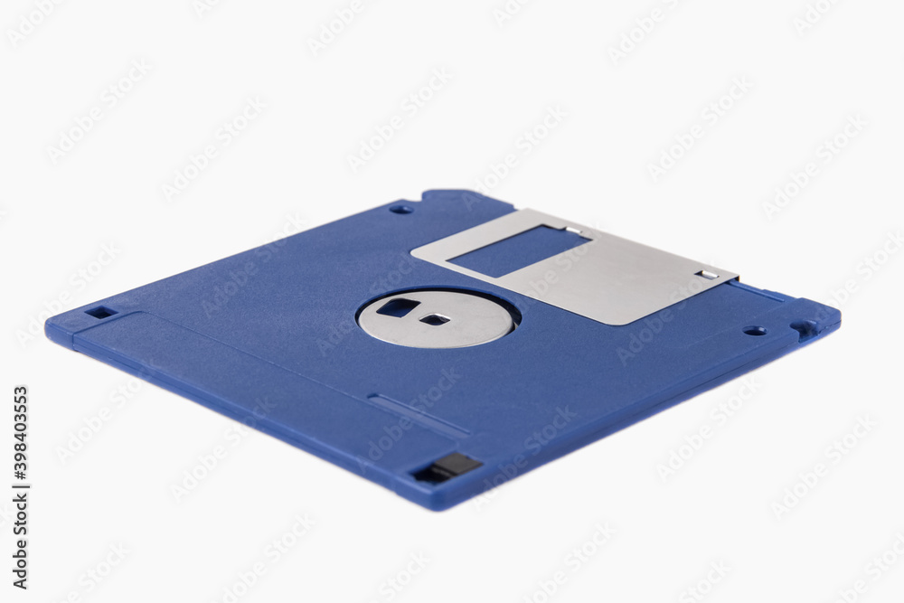 The back of a blue floppy disk isolated on a white background The back of a blue floppy disk isolated on a white background