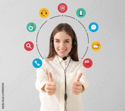 Female technical support agent with digital icons on light background