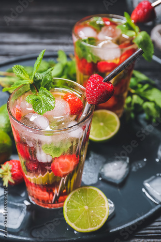 Glasses of fresh strawberry mojito cocktail  on tray