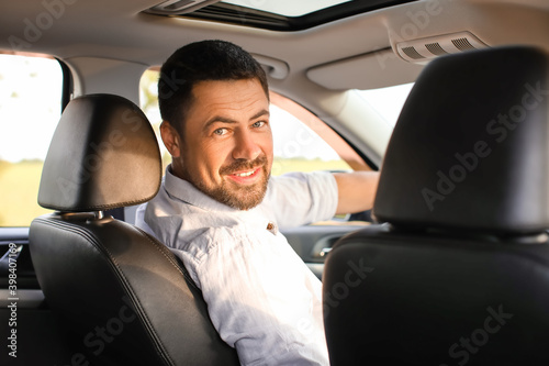 Handsome man driving modern car © Pixel-Shot