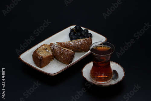 Turkish tea and cake grapes plate top
