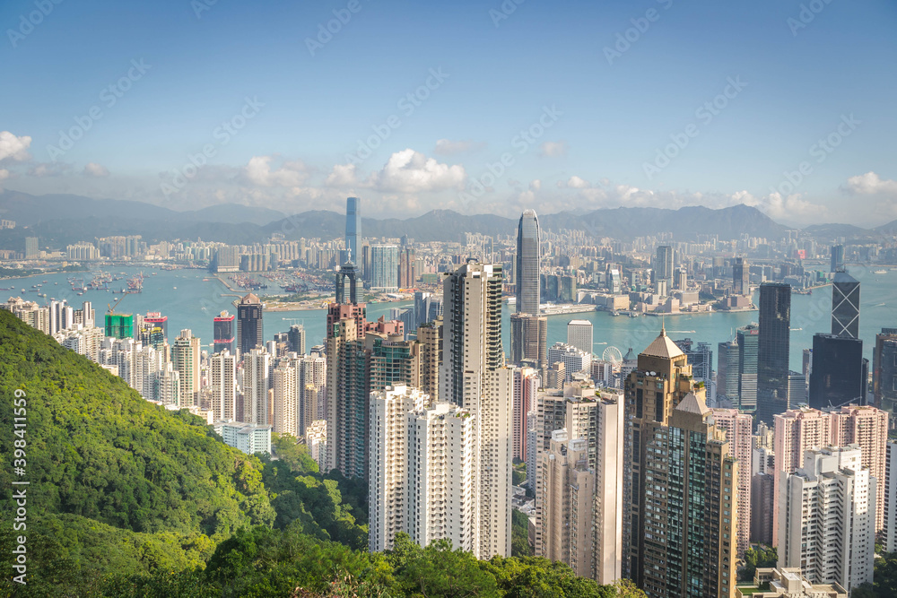 Fototapeta premium scenery of Hong Kong's Victoria Harbour and skyscraper buildings cityscape from Victoria Peak