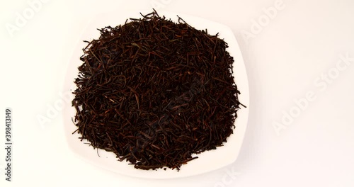 herbal tea in dry leaves close-up on a white background video 4k