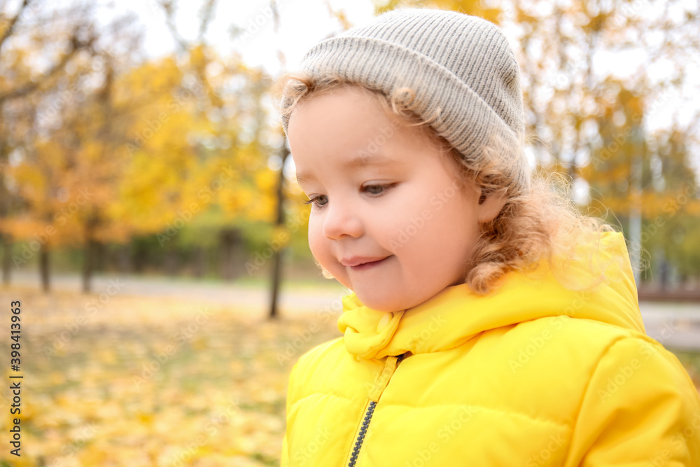 Cute little girl in autumn park Cute little girl in autumn park