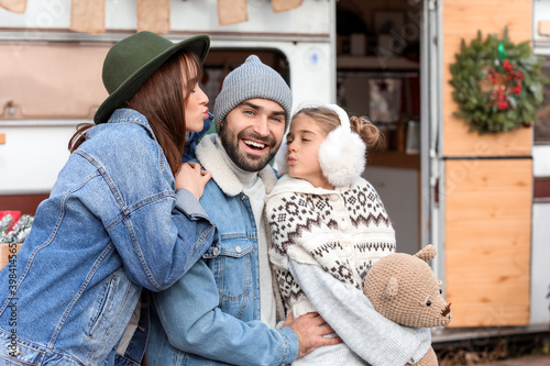 Happy family outdoors on Ch...