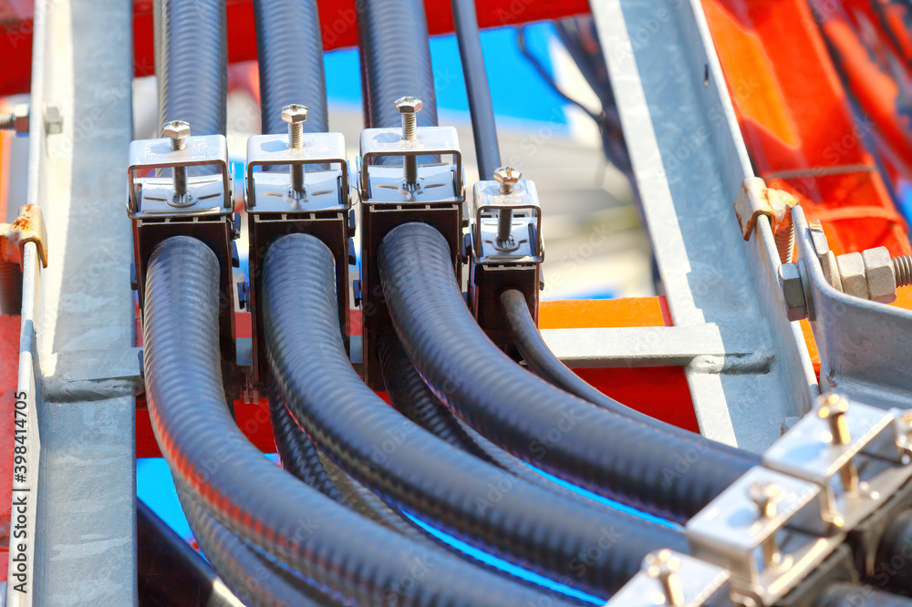 Communications tower for tv, internet and mobile phone signals.Connection of internet data cables in telecommunication tower Communications tower for tv, internet and mobile phone signals.Connection of internet data cables in telecommunication tower