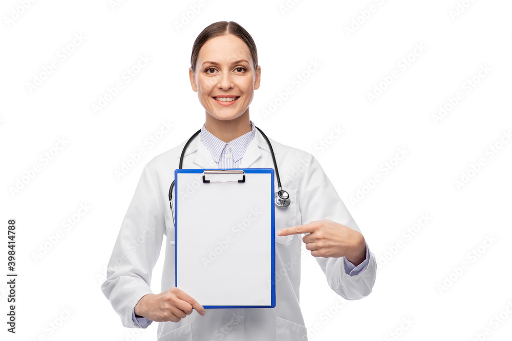 medicine, profession and healthcare concept - happy smiling female doctor in white coat showing clipboard medicine, profession and healthcare concept - happy smiling female doctor in white coat showing clipboard