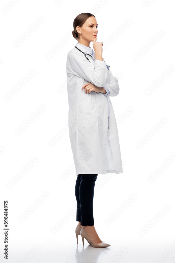 medicine, profession and healthcare concept - thinking female doctor in white coat medicine, profession and healthcare concept - thinking female doctor in white coat