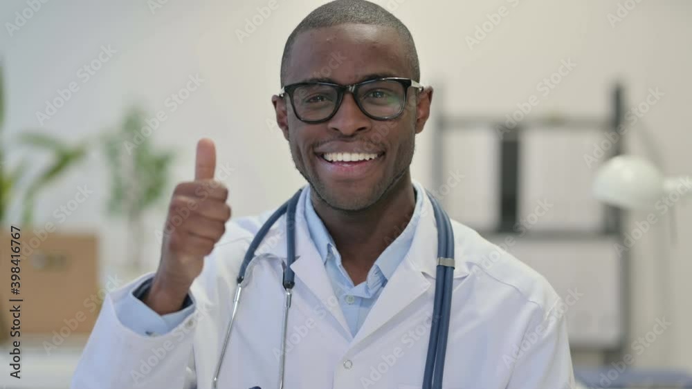 Thumbs Up by African Doctor in Clinic Thumbs Up by African Doctor in Clinic