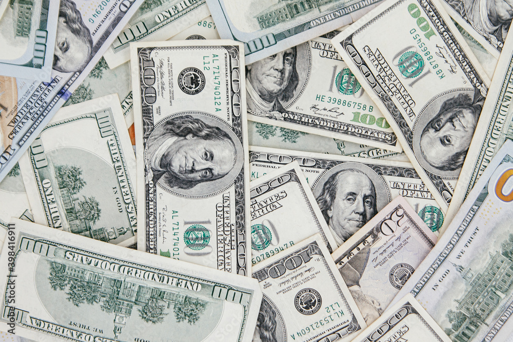 American banknotes 100 dollars. Background from dollars American banknotes 100 dollars. Background from dollars