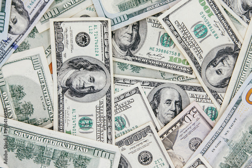 American banknotes 100 dollars. Background from dollars American banknotes 100 dollars. Background from dollars