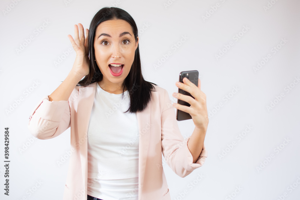 Portrait of a happy young business woman using mobile phone isolated over white background Portrait of a happy young business woman using mobile phone isolated over white background