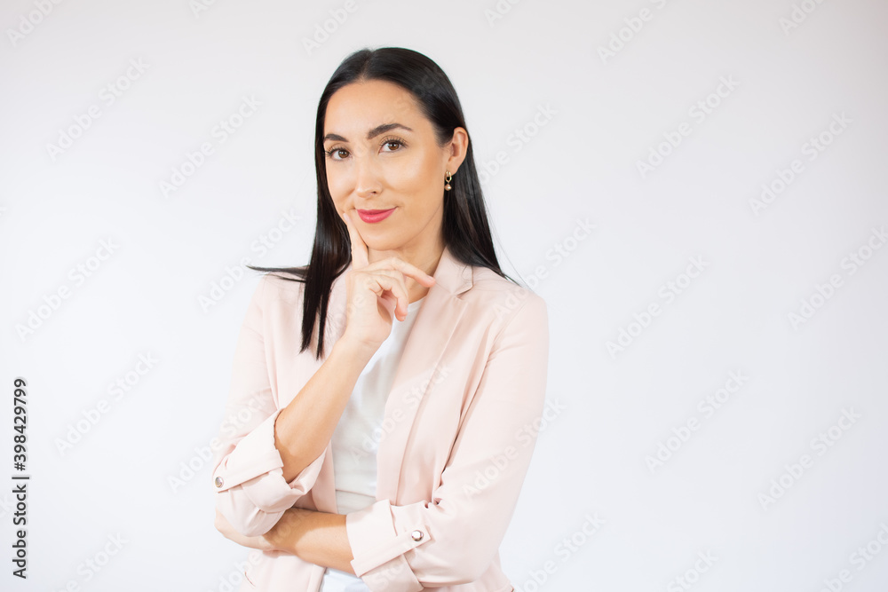 Young beautiful business woman isolated background confuse and wondering about question. Uncertain with doubt, thinking with fingers on face. Pensive concept. Young beautiful business woman isolated background confuse and wondering about question. Uncertain with doubt, thinking with fingers on face. Pensive concept.