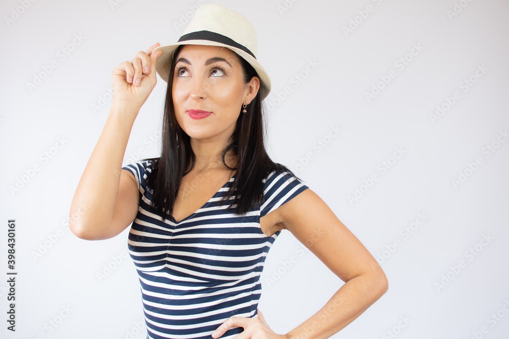 Close up portrait of young beautiful woman wearing straw hat smiling over white background. Close up portrait of young beautiful woman wearing straw hat smiling over white background.