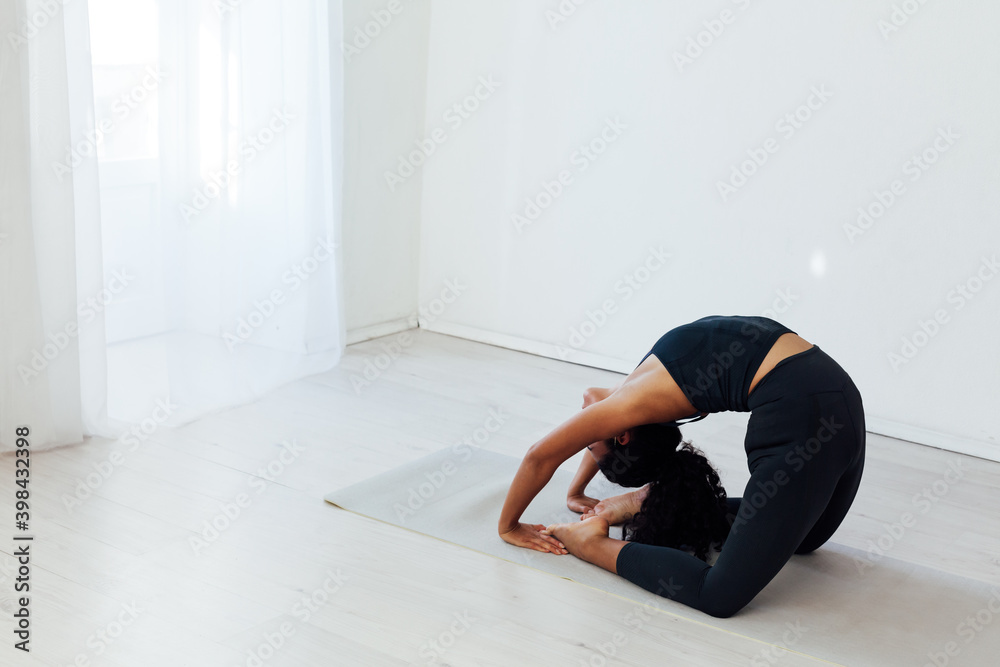 Beautiful female yoga asana gymnast sports white hall house Beautiful female yoga asana gymnast sports white hall house