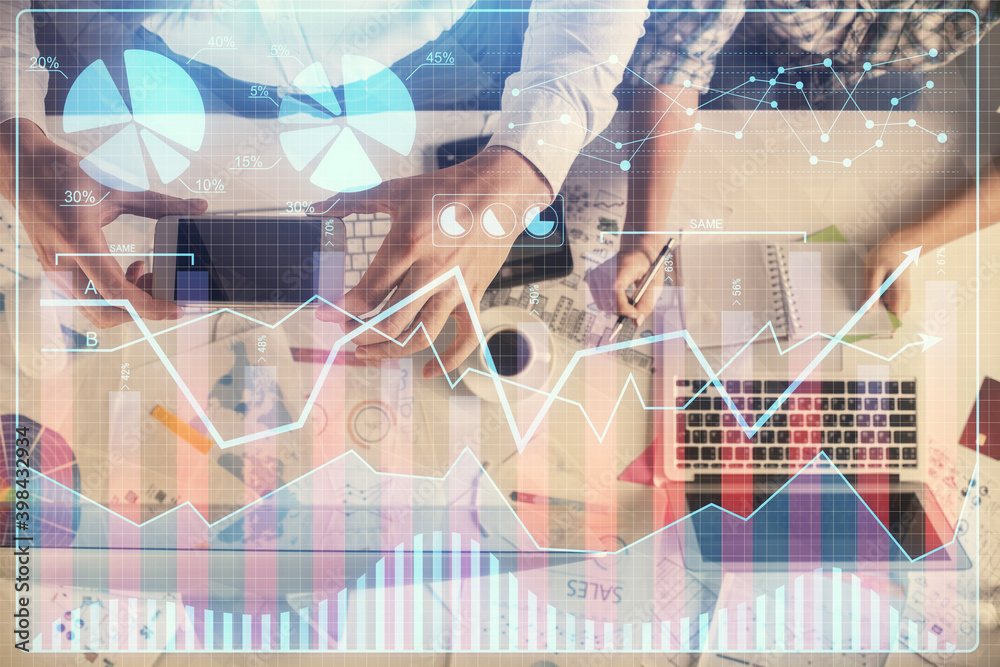 Double exposure of man and woman working together and financial chart hologram drawing. market analysis concept. Computer background. Top View. Double exposure of man and woman working together and financial chart hologram drawing. market analysis concept. Computer background. Top View.