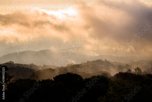 Sunrise on the mountain with fog