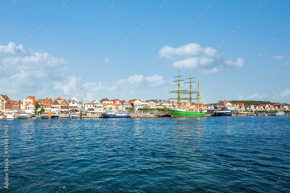 Boats in the harbor of Travemünde on a sunny summer day