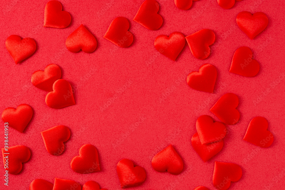 Hearts on red background. Top view. Copy space Hearts on red background. Top view. Copy space