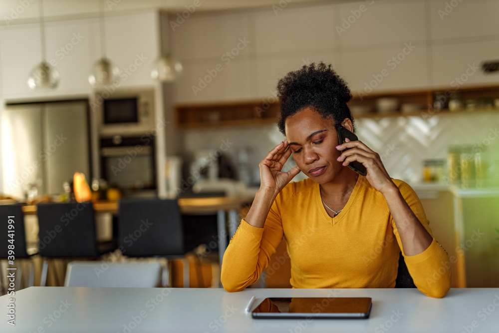 Using phone and talking with her client. Using phone and talking with her client.
