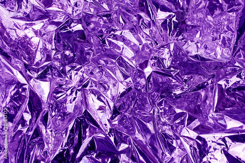 Abstract texture crumpled purple foil paper
