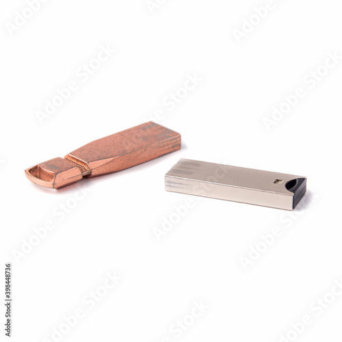 Two old USB flash drives isolated on a white background