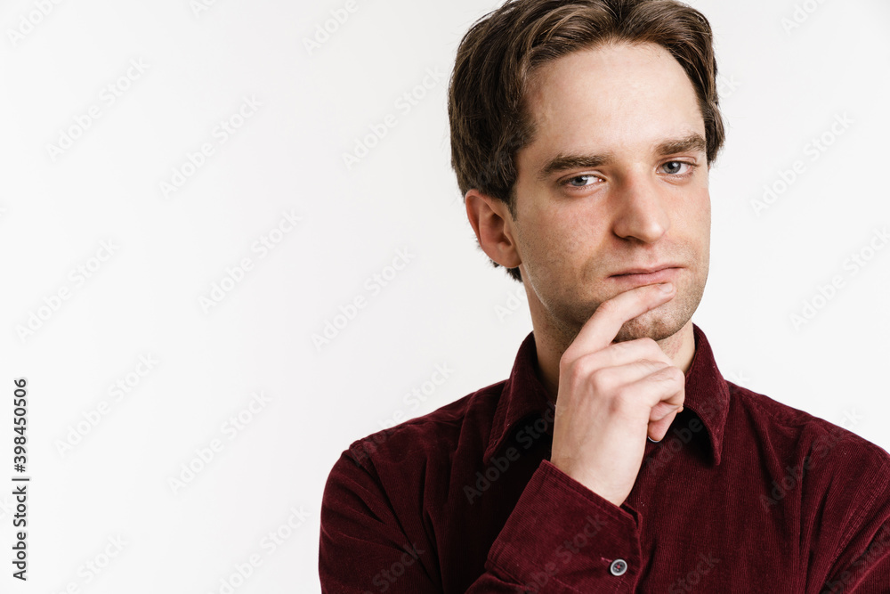 Handsome serious guy posing and looking at camera Handsome serious guy posing and looking at camera