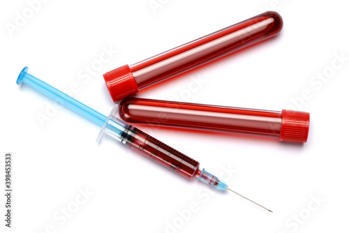 Medical syringe and plastic test tube isolated on white background