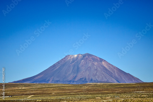 Volcano seen from the front with blue sky
