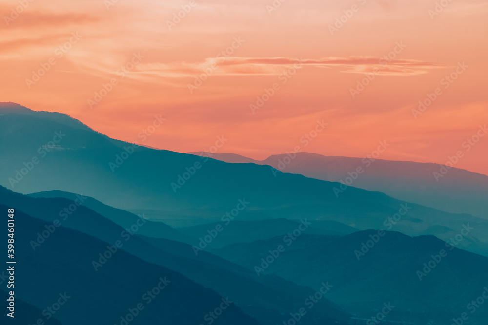Sun setts over  Caucasus Mountains. Joyful motivational bright colorful image. Georgia 