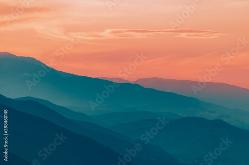 Sun setts over Caucasus Mountains. Joyful motivational bright colorful image. Georgia 