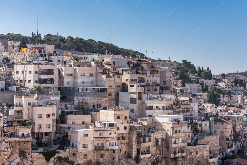 Residential houses at the Mount of Olive and Kidron Valley  under the sunlight in the morning in Jerusalem, Israel