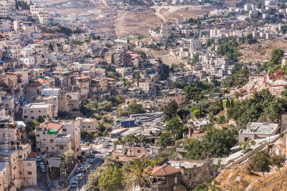 Residential houses at the Mount of Olive and Kidron Valley  under the sunlight in the morning in Jerusalem, Israel