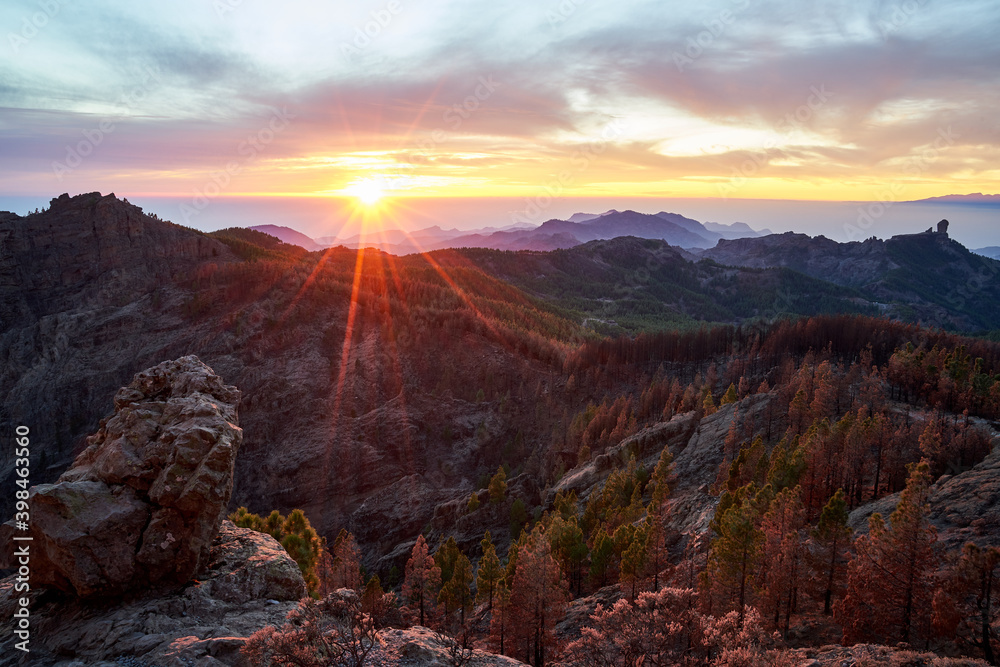 Sunset over the island of Gran Canaria, Spain seen from the Pico de las Nieves