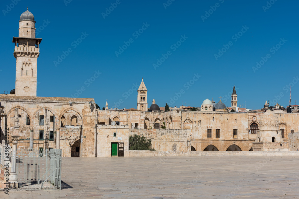 Historic buildings and skylines with Church of the holy sepulchre, Lutheran Church of the Redeemer, monastery of saint saviour, view from the platform of Dome of the rock, Jerusalem, Israel.