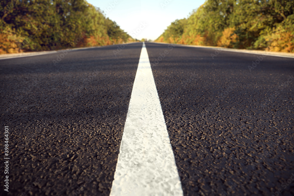 Obraz premium Beautiful view of empty asphalt highway, closeup. Road trip