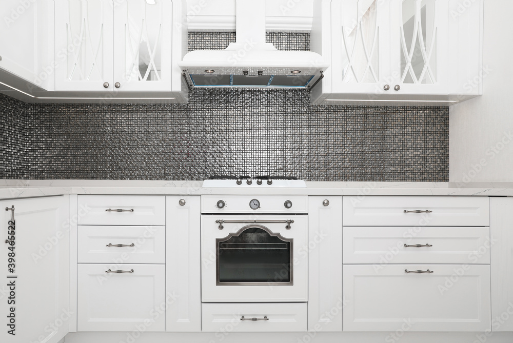 Fototapeta premium Beautiful kitchen interior with new stylish furniture