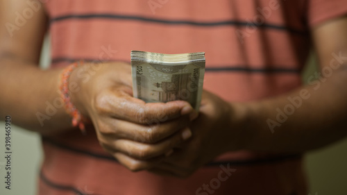 Photography Indian currency in human hand