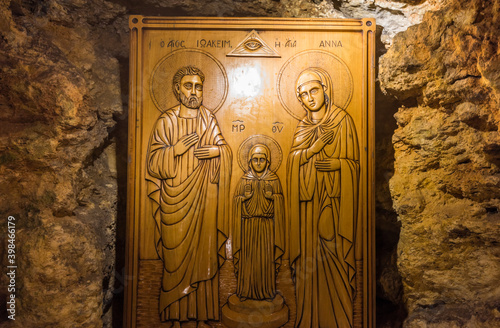 Bas-reliefs of Baby Jesus and parents Birth place of Virgin Mary under the Church of St Anne in Jerusalem old town, Israel
