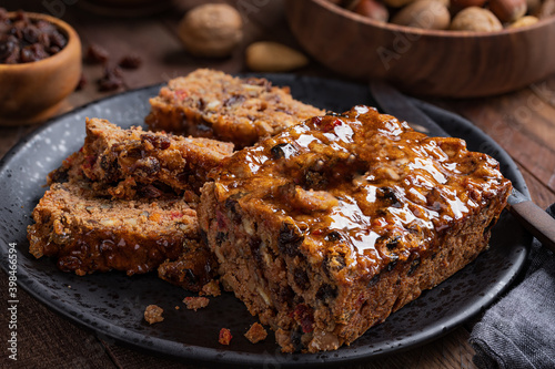 Fruitcake Loaf Sliced on a Plate