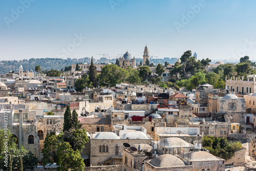Aerial view of rooftops of buildings in the old city with Abbey of the Dormition of Jerusalem. View from the Lutheran Church of the Redeemer.