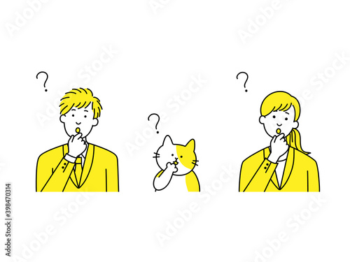 首をかしげるスーツ男女と猫