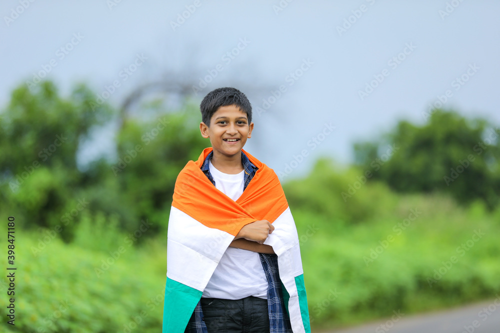 Cute little boy with Indian National Tricolor Flag