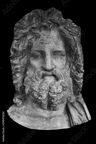 Mighty god Zeus. Ancient statue isolated on black background.