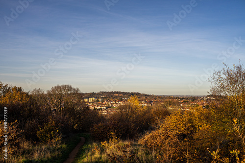 autumn landscape in the evening, with a countryside village in the background